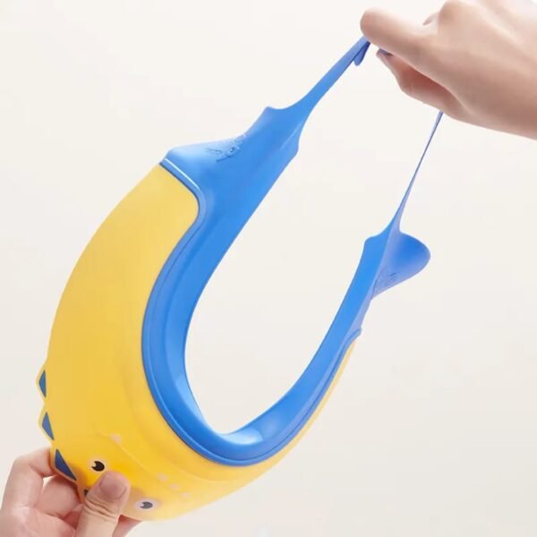 Hafta Bazaar by “Cute dinosaur-themed baby shower cap that keeps water and shampoo out of a baby’s eyes during bath time.”