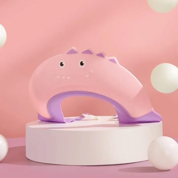 Hafta Bazaar by “Cute dinosaur-themed baby shower cap that keeps water and shampoo out of a baby’s eyes during bath time.”