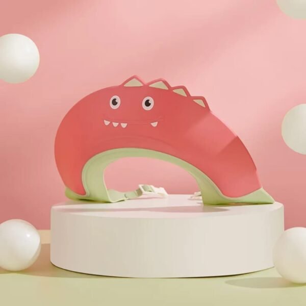 Hafta Bazaar by “Cute dinosaur-themed baby shower cap that keeps water and shampoo out of a baby’s eyes during bath time.”