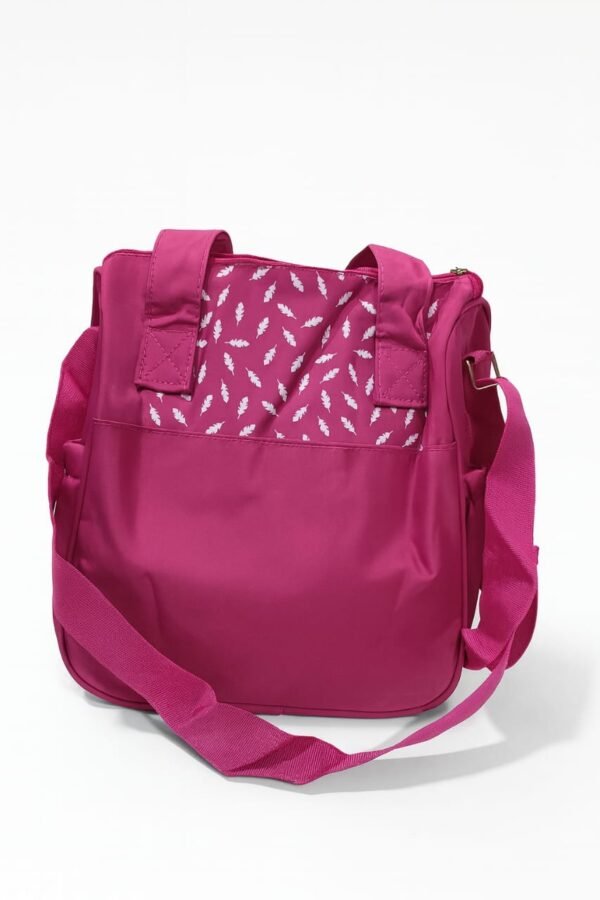 Hafta Bazaar by “Welcome Baby pink small diaper bag with cute teddy embroidery, ideal for carrying baby essentials.”